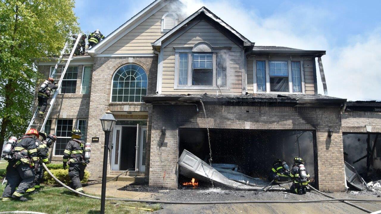 Four firefighters hurt, one seriously, battling Indianapolis house fire