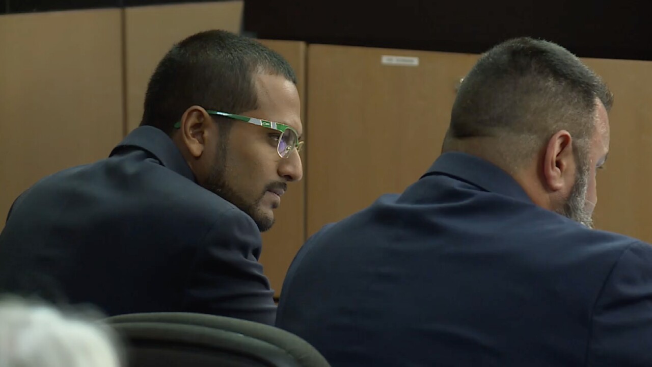 Westward Elementary School teacher Christopher Persaud sits in a Palm Beach County courtroom on April 26, 2022.jpg