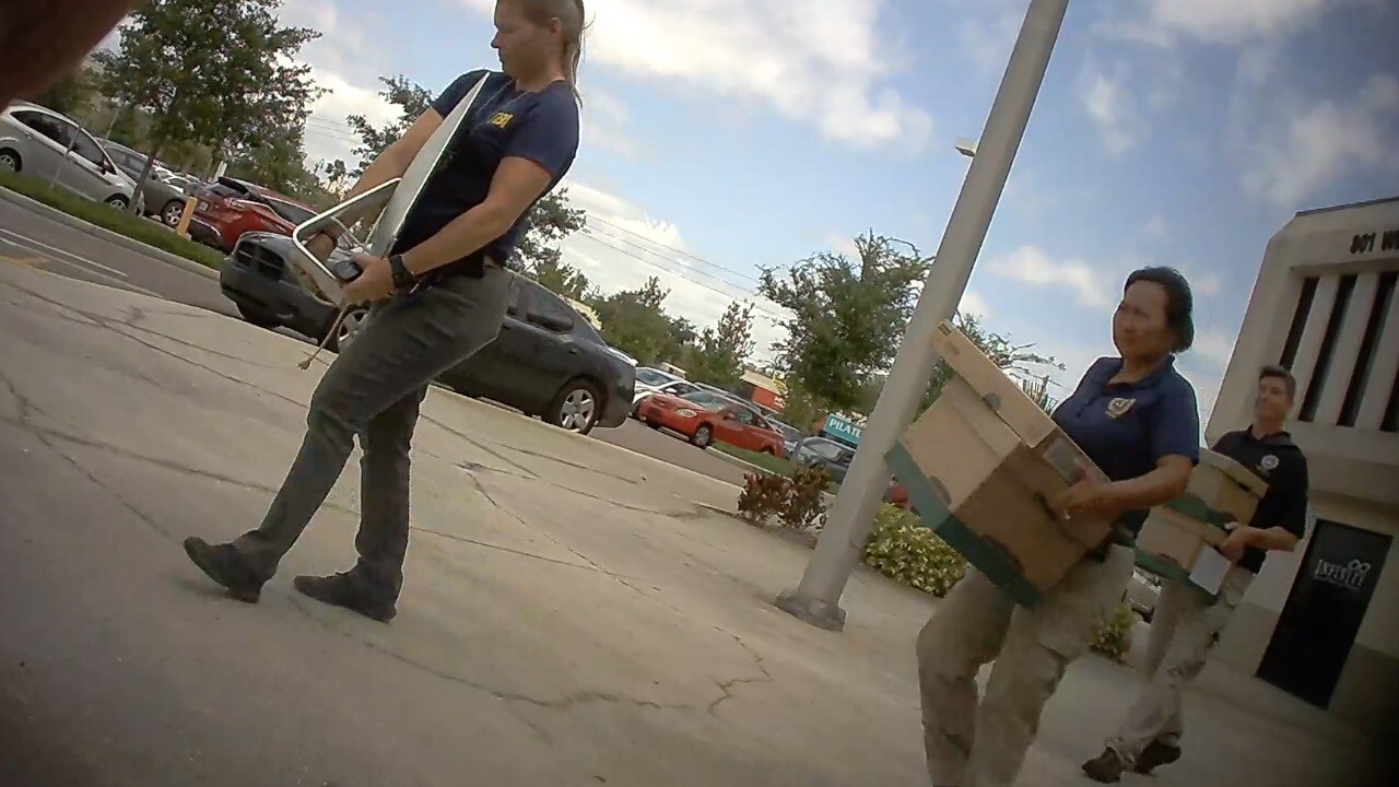 Federal agents execute a search warrant at 801 W. Bay in Largo