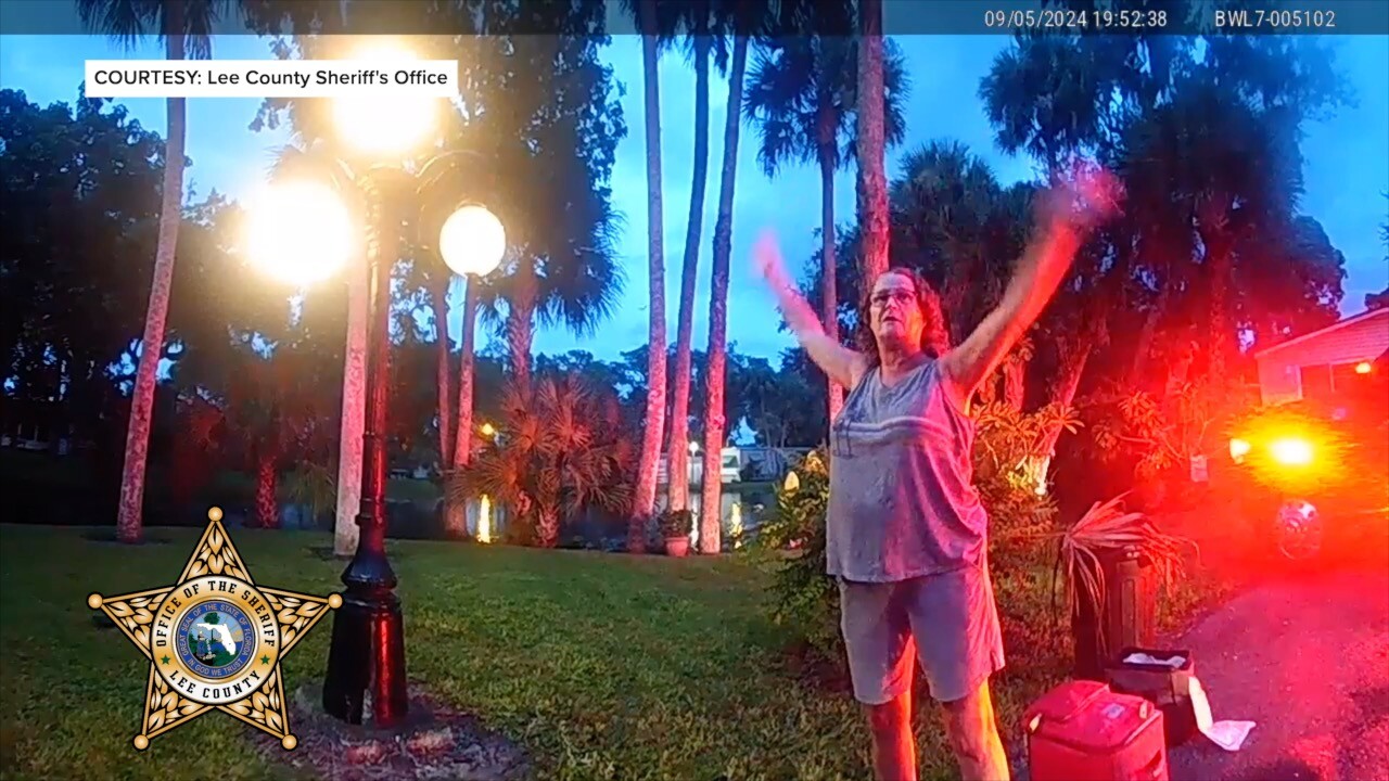 LCSO body-cam video showing witness waving her hands above her head.