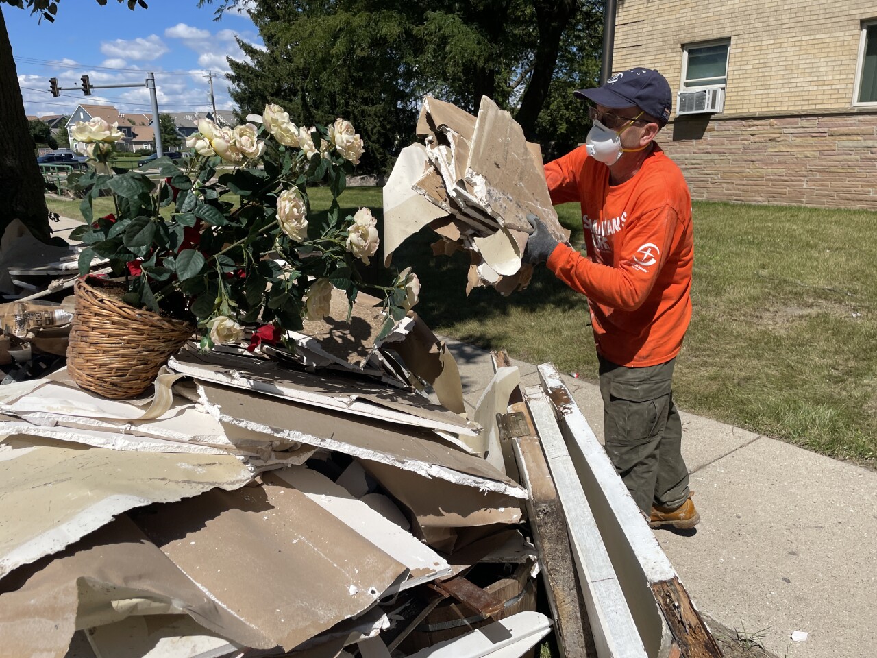 The faith-based nonprofit has mobilized more than 80 volunteers across Milwaukee, with about a dozen assigned to the senior complex.