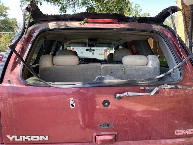 Shattered glass & bullet hole