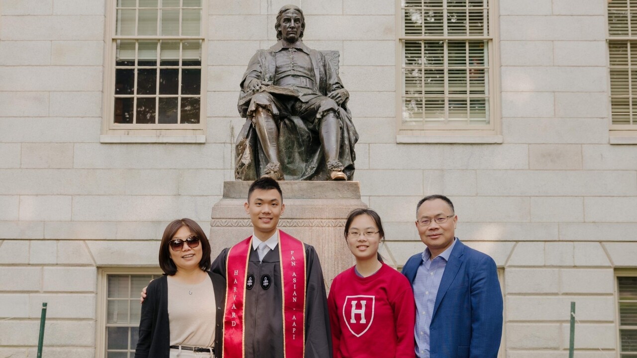 Hongyue Wang, with husband Changyong Feng and children Raymond and Amy.