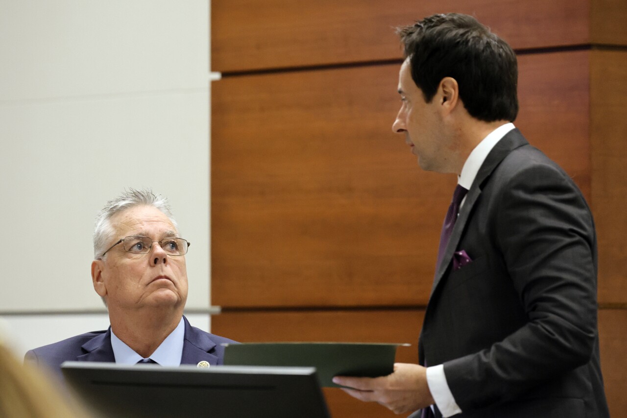 Scot Peterson speaks with defense attorney Mark Eiglarsh during his trial, June 21, 2023
