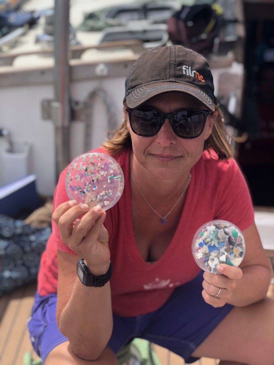 CEO Lindsey McCoy aboard the plastic research sailing vessel