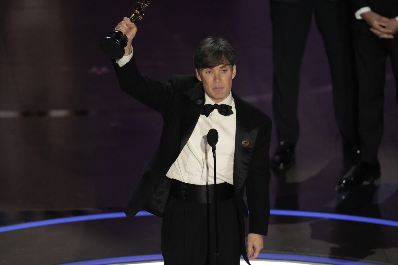 Cillian Murphy holds up Oscar after winning best actor for 'Oppenheimer,' March 10, 2024