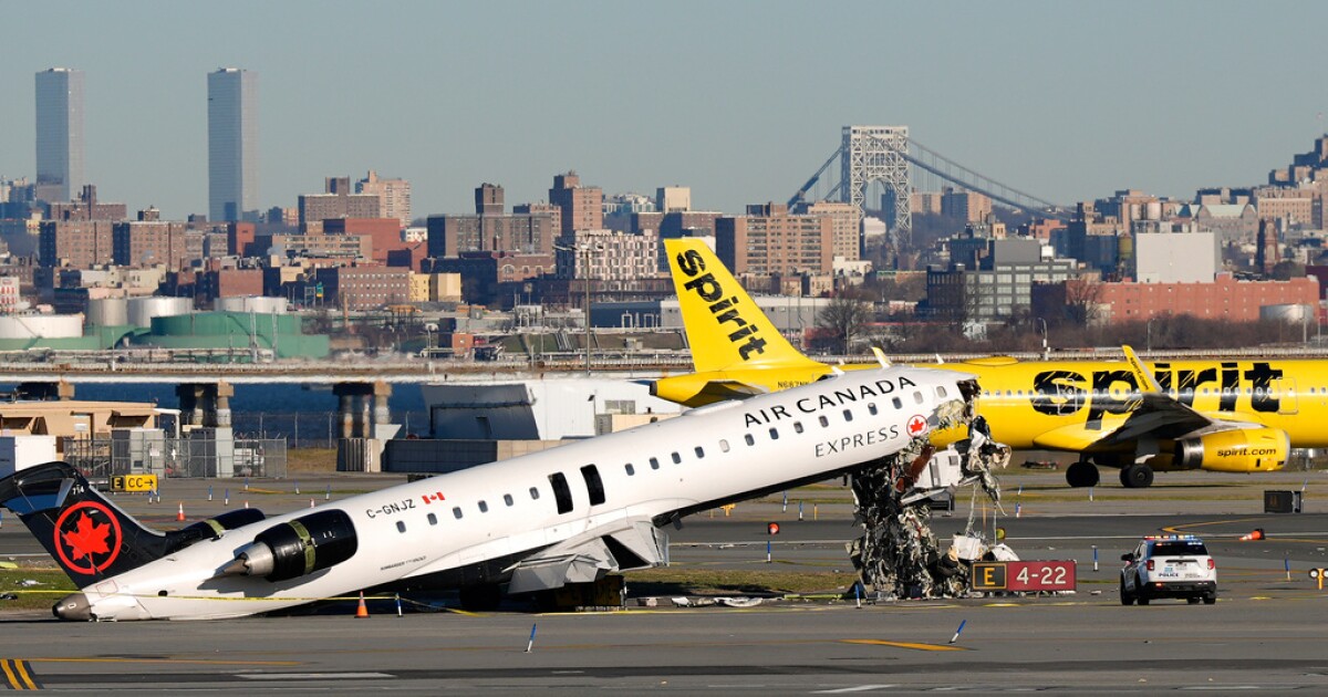 Plane was going 104 mph when it hit fire truck at LaGuardia, analysis shows