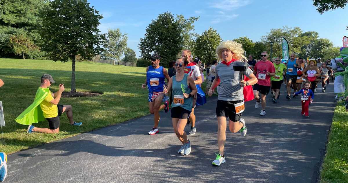 Runners in capes run for CASA of Lexington