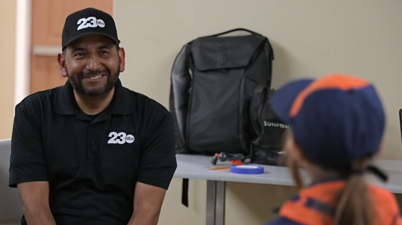 23ABC Neighborhood News Reporter Steve Virgen Interviewing a Cub Scout, Jesse Jo McMillen