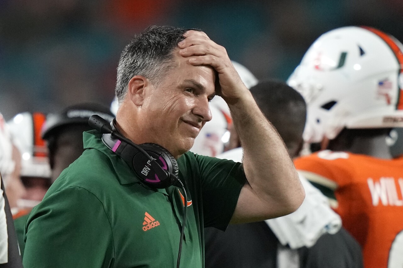 Miami Hurricanes head coach Mario Cristobal puts hand on head vs. Pittsburgh Panthers, Nov. 26, 2022