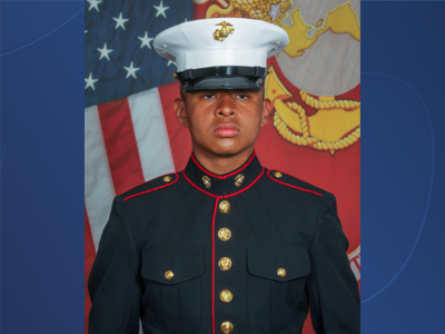 Lance Cpl. Armando Ortiz Canseco Blue background