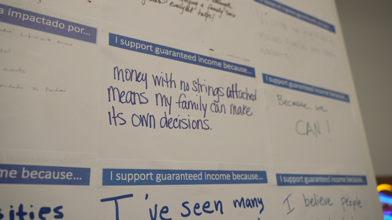 guaranteed income project boulder art piece written word main library