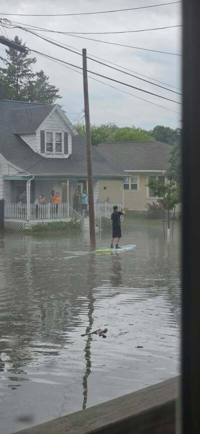 Darcy Bruechert sent us this photo of a person using a paddle board to get through their neighborhood 