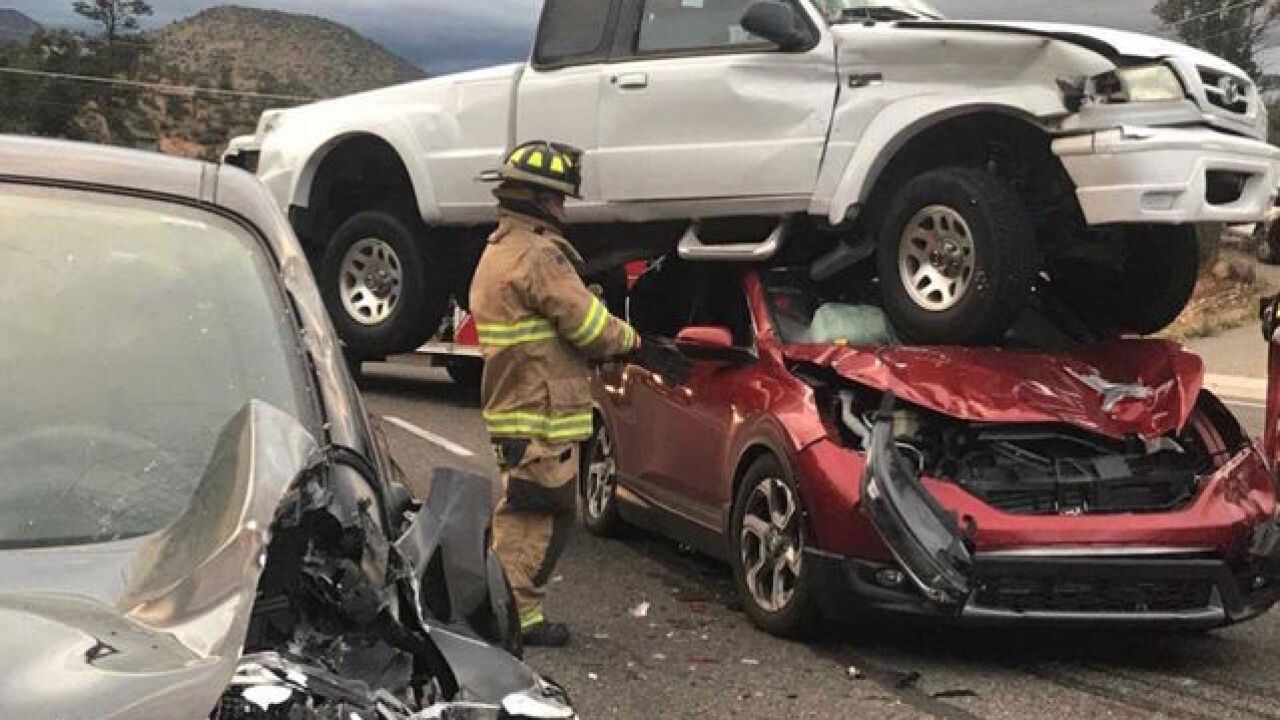 Pickup truck lands on top of car in Arizona no one hurt Pickup truck lands on top of car in Arizona no one hurt