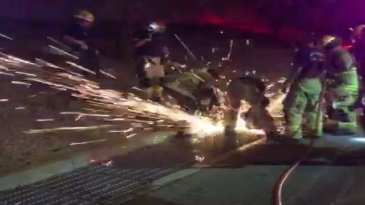 Man, woman rescued from storm drain