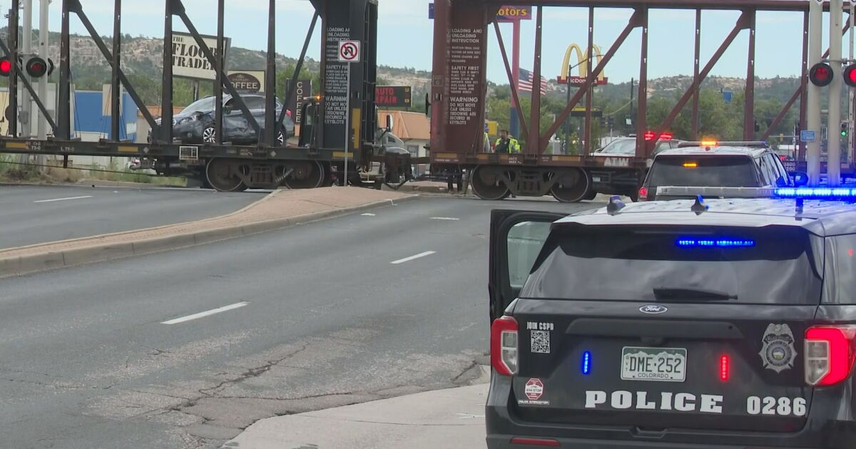 Driver cited after vehicle collides with moving train Tuesday