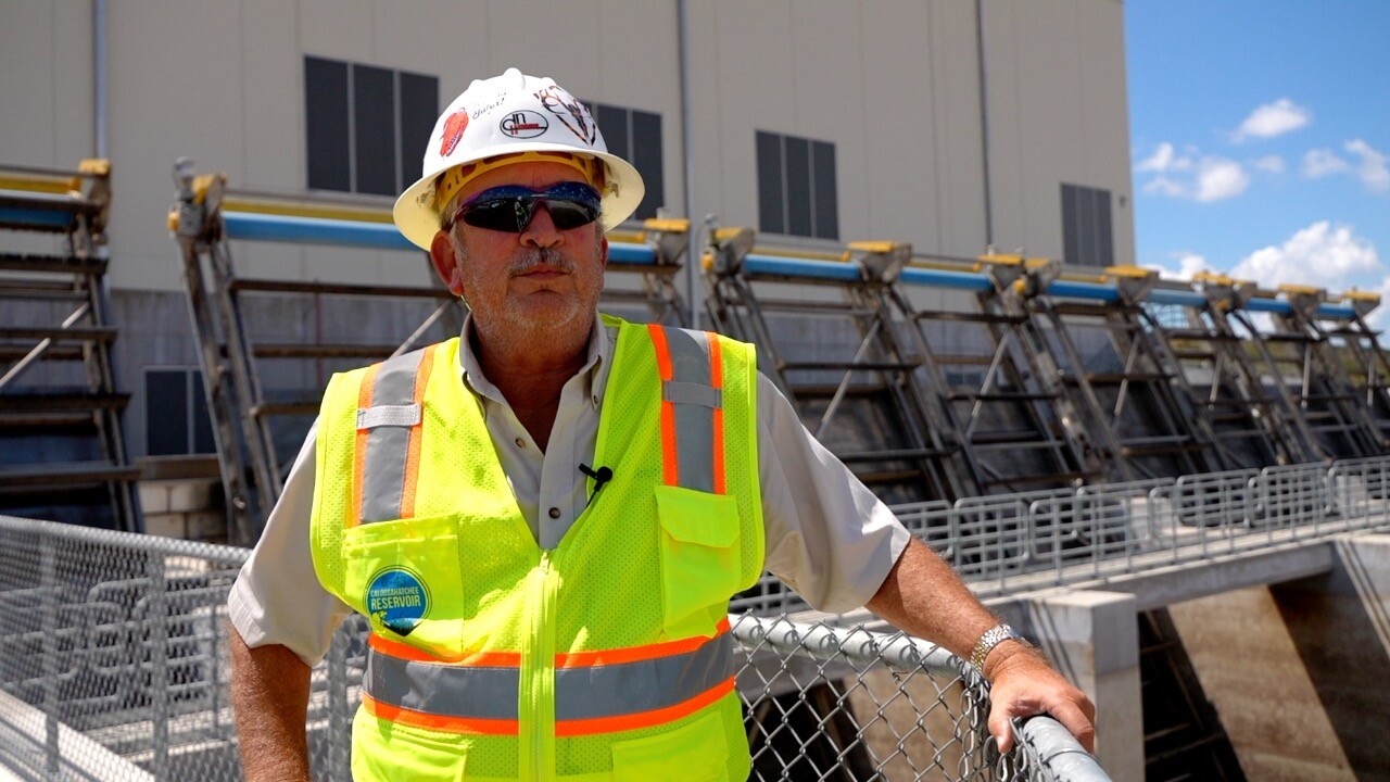 C-43 Reservoirs Construction Manager, John Creswell, in front of the main pump station at the reservoir.
