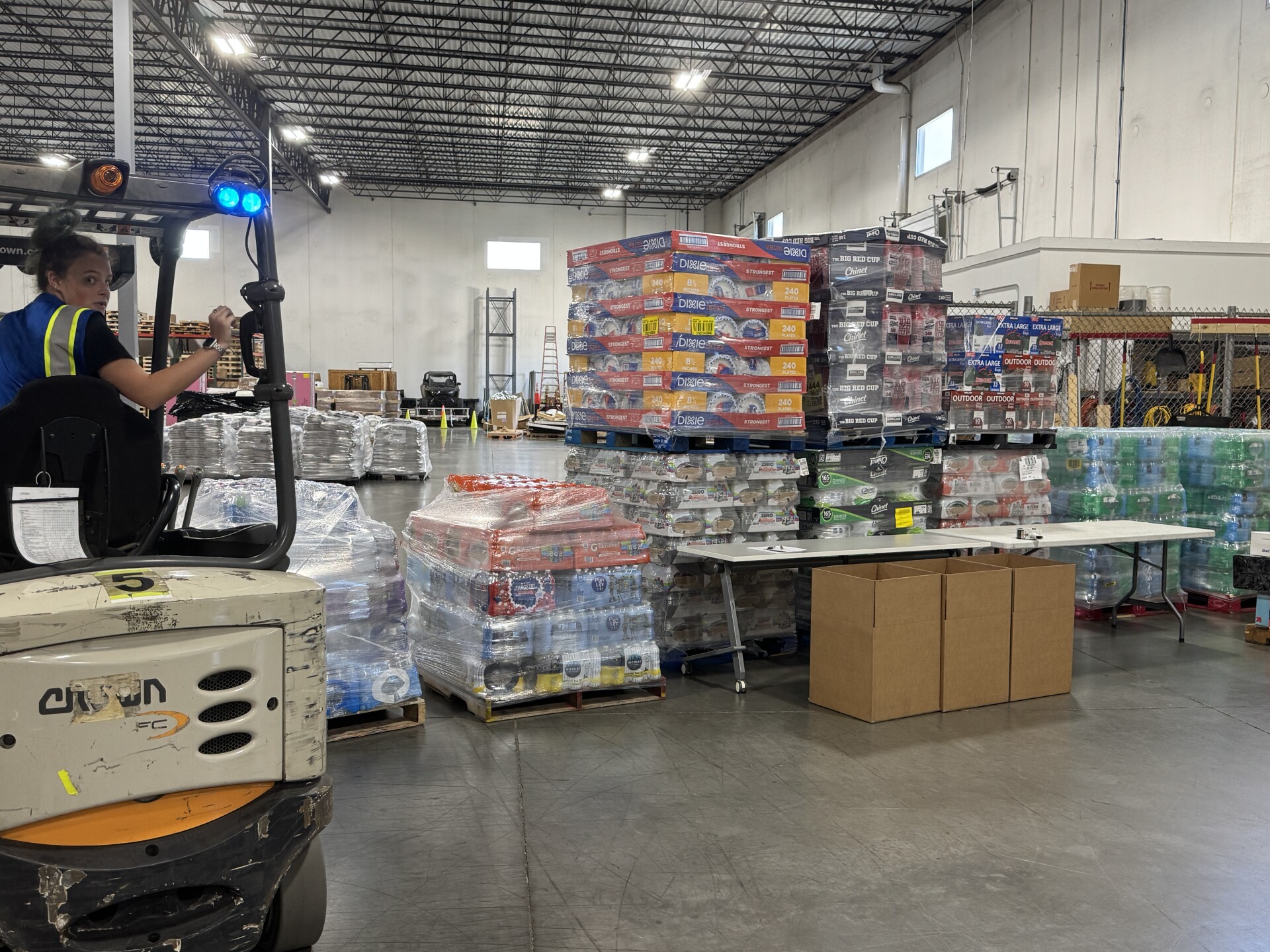 Donations being loaded up into the semi trailer. 