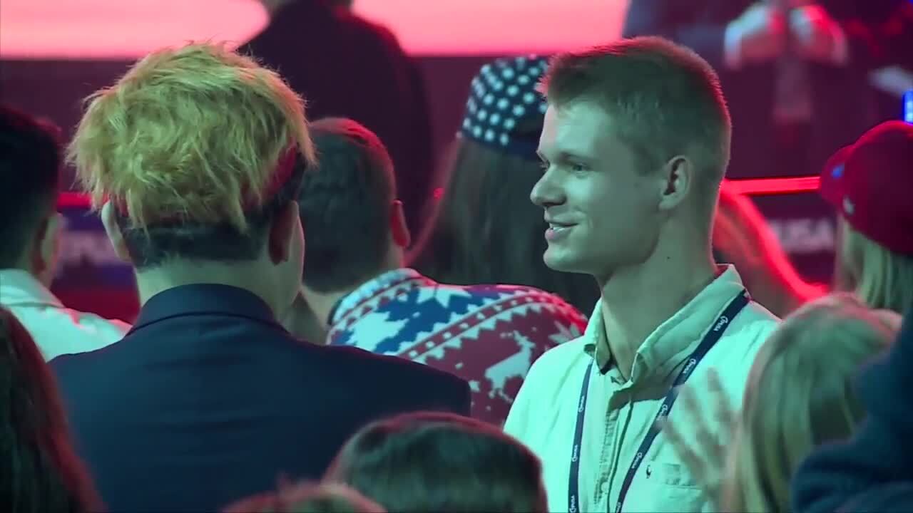 People in close proximity not wearing masks at Turning Point USA conference, Dec. 22, 2020