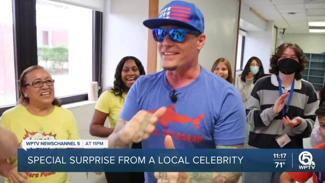 Vanilla Ice surprises the 'Lunch Lady Squad' at Wellington Landings Middle School on May 12, 2022 (1).jpg