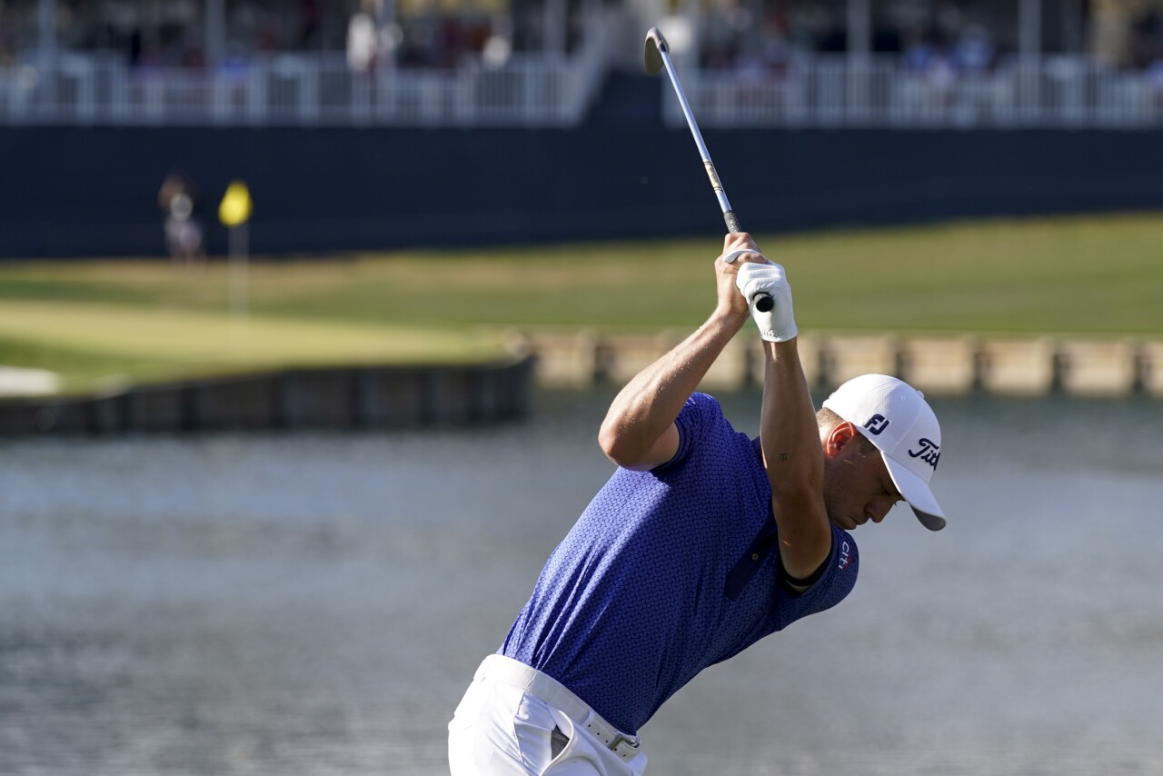 Justin Thomas hits tee shot from 17th hole at 2021 The Players Championship