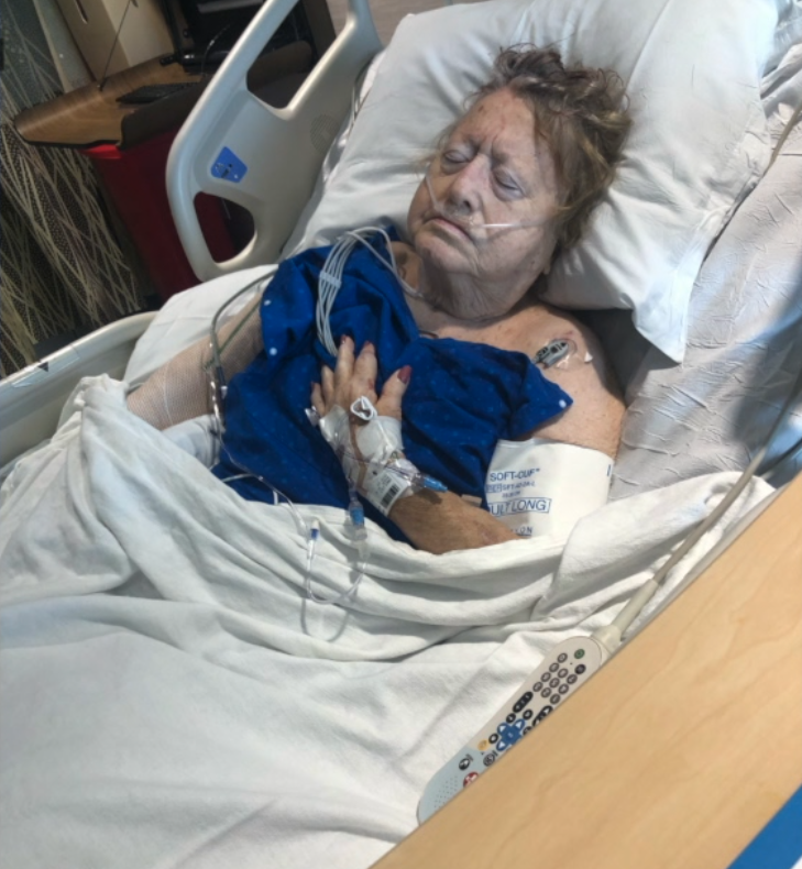 Lily Carl in hospital.png