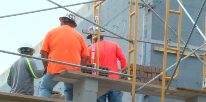 construction workers close together.bmp