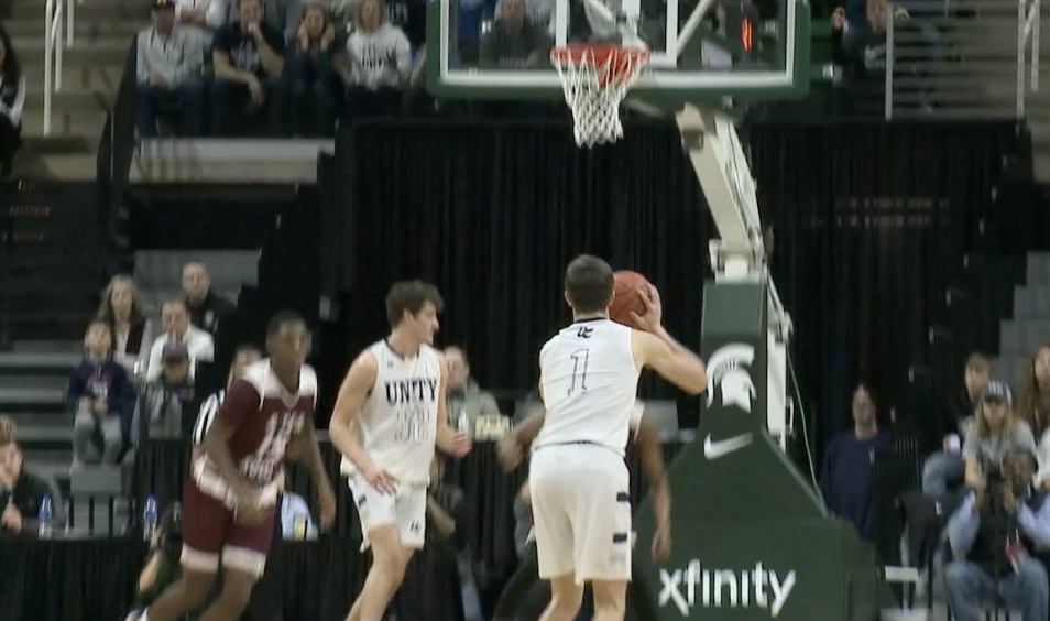 Noah Wiswary attempts a three-pointer in state finals