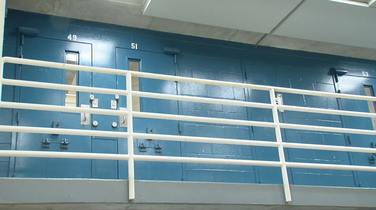 Padlocked cells with broken windows at the Hamilton County Justice Center. 