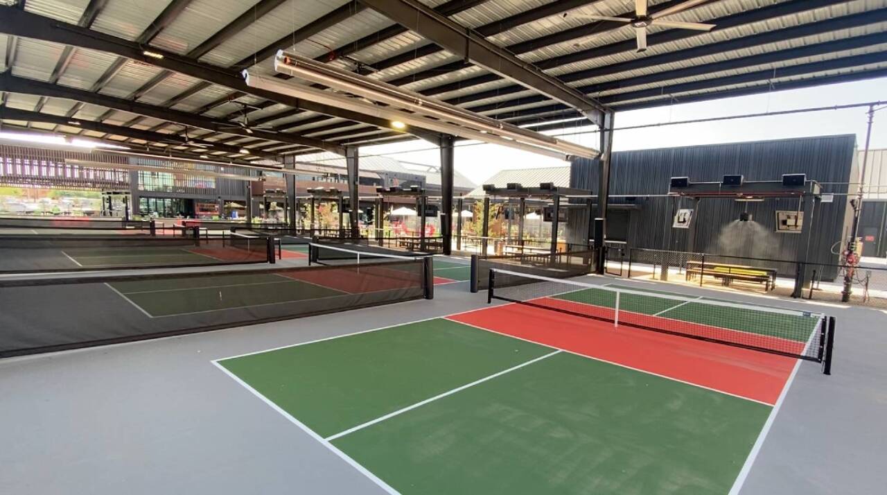 A look at the five side by side outside pickleball courts.