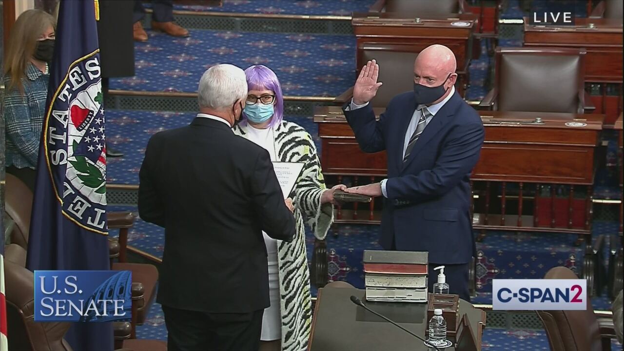 Here’s why Sen. Kyrsten Sinema wore a wig to Mark Kelly’s swearing-in ceremony