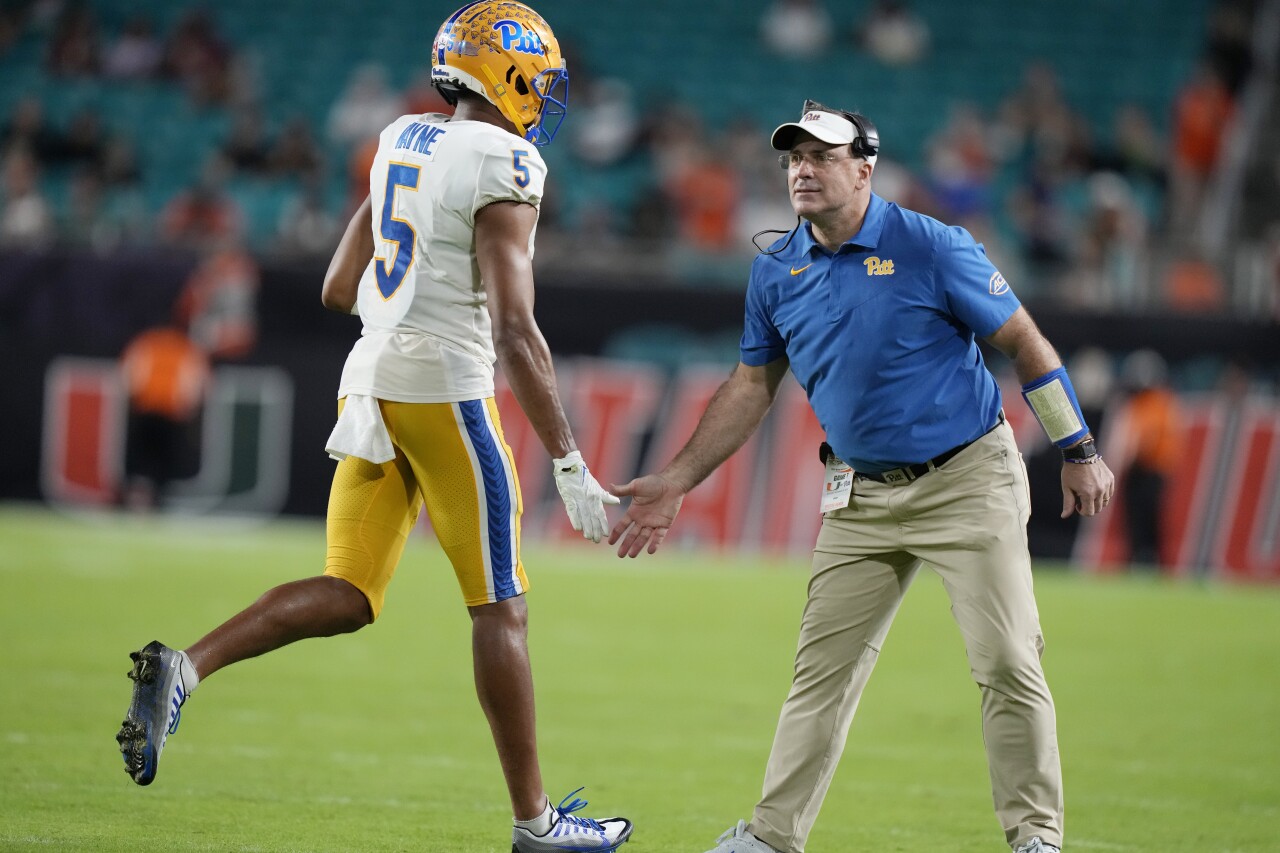 Pittsburgh Panthers head coach Pat Narduzzi greets wide receiver Jared Wayne, Nov. 26, 2022