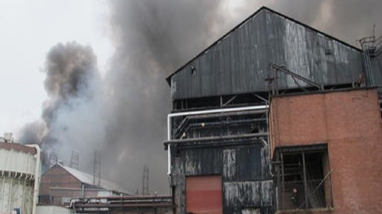 Hot bulb hitting cardboard sparked massive NY fire, official says