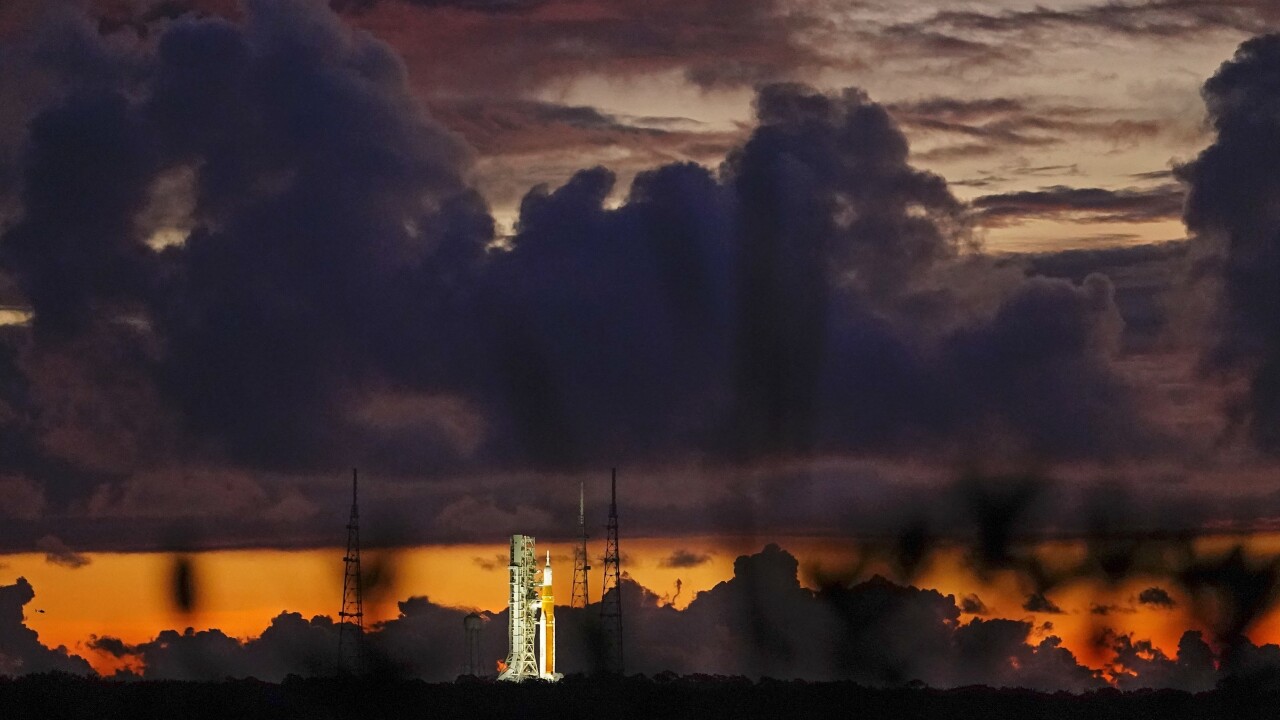 Artemis 1 on launch pad at sunrise, Aug. 29, 2022