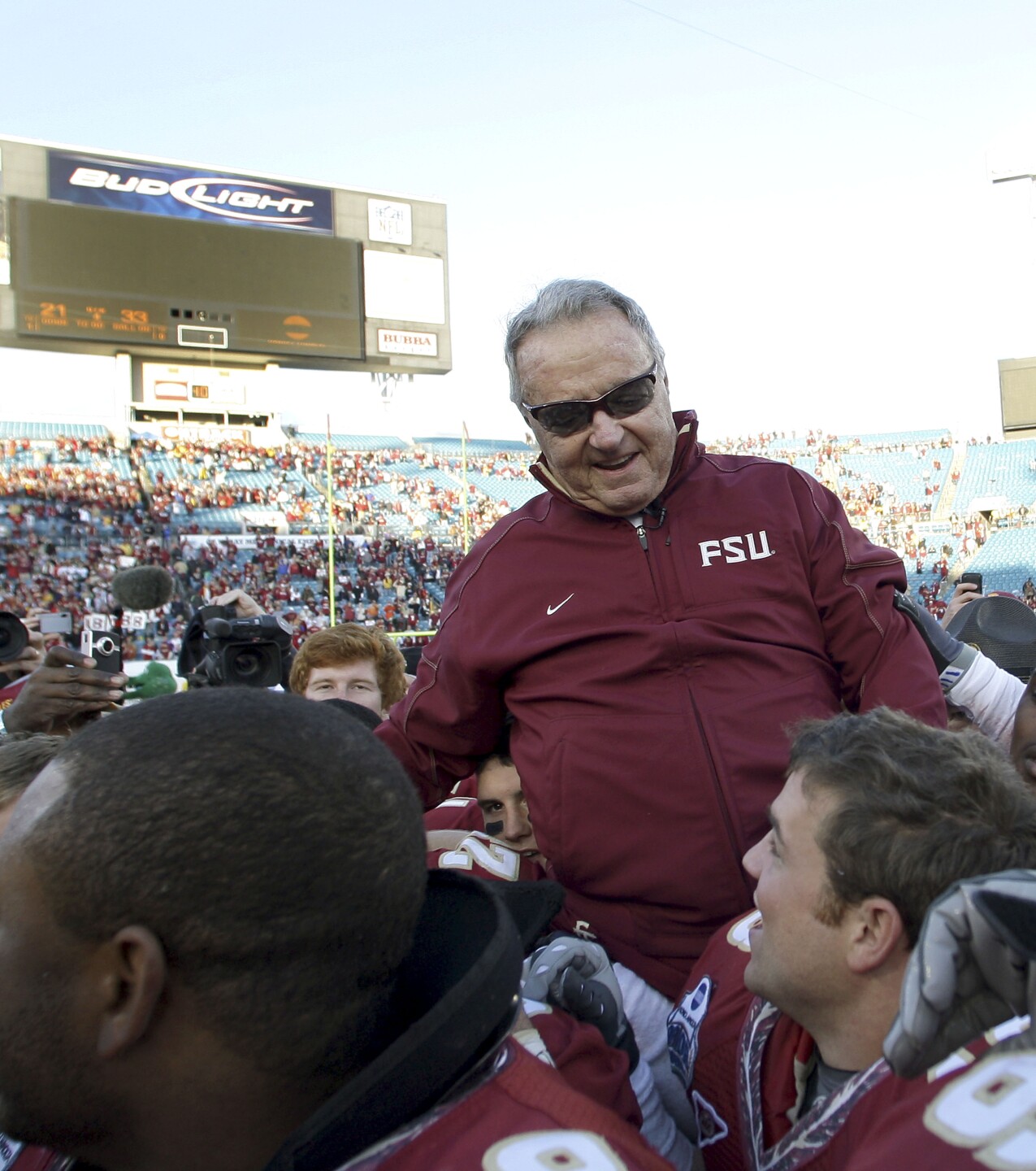 Florida State Seminoles head coach Bobby Bowden carried off field after 2010 Gator Bowl victory