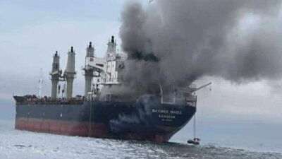 This image released by the Royal Thai Navy shows Thai cargo ship, Mayuree Naree, that was struck and set ablaze in the Strait of Hormuz Wednesday, March 11, 2026. 