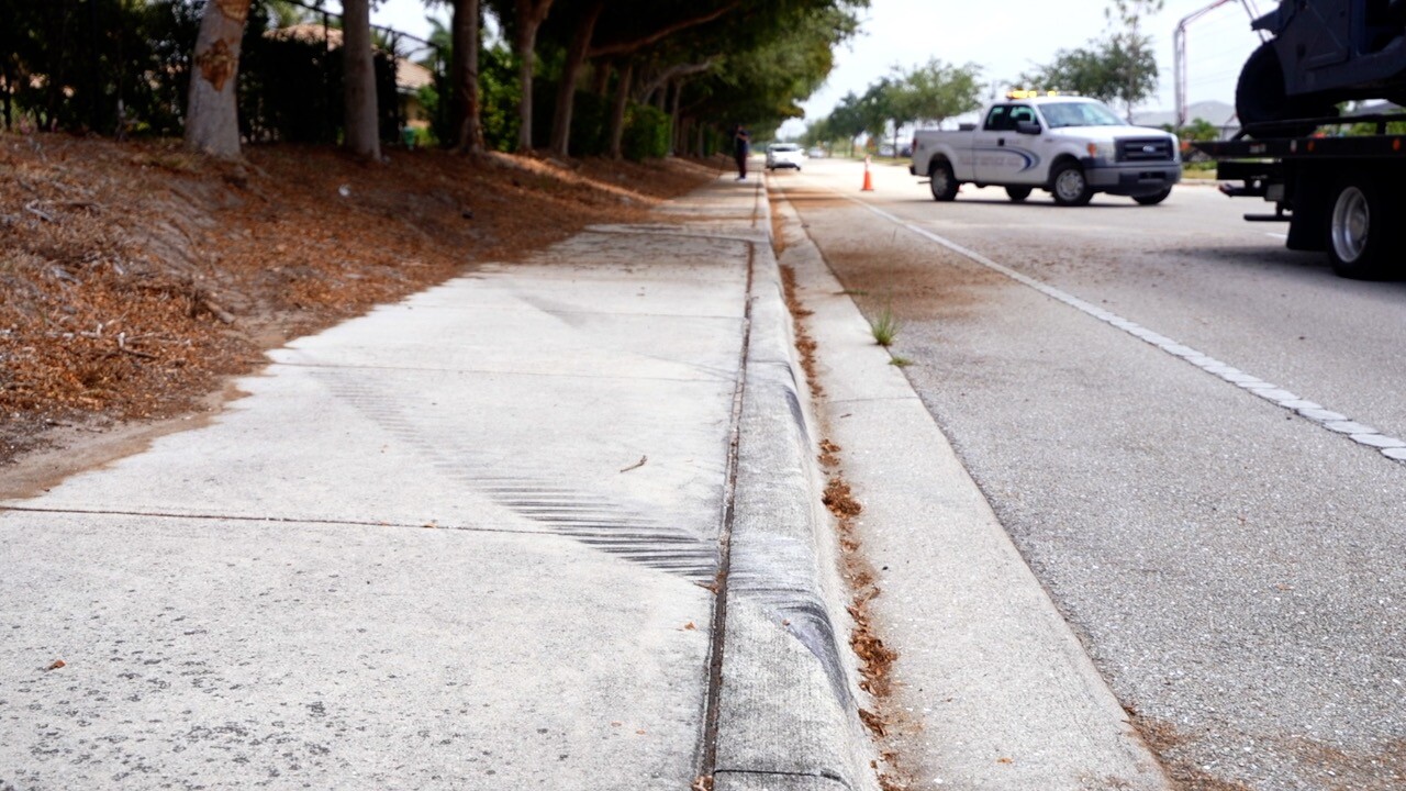 Skid marks on the side walk leading to the tree the Humvee crashed into on Surfside Boulevard in Cape Coral.