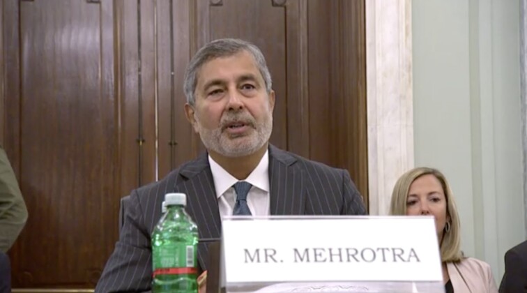 Micron CEO Sanjay Mehrotra appears on Capitol Hill during a hearing Wednesday morning.