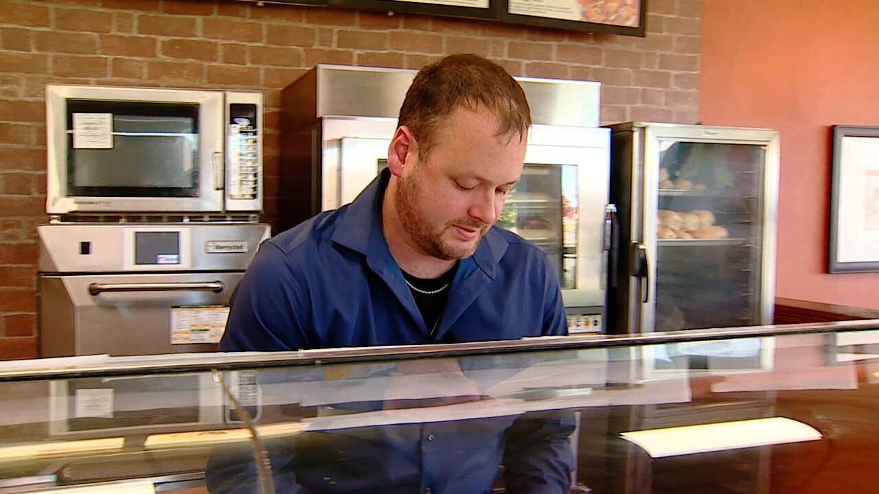 Seth Coxon at the counter.jpg