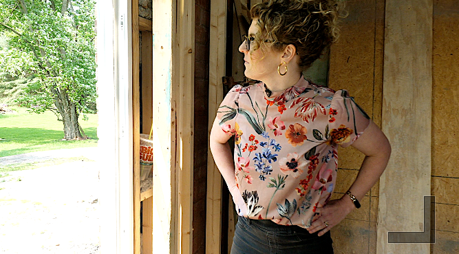 Stacie looks out future backyard