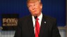 Absent Trump says he wanted to attend debate