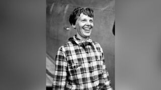FILE - In this June 6, 1937, file photo, Amelia Earhart, the American airwoman who is flying round the world for fun, arrived at Port Natal, Brazil, and took off on her 2,240-mile flight across the South Atlantic to Dakar, Africa. A new documentary "Amelia Earhart: The Lost Evidence," which airs Sunday, July 9, 2017, on the History channel, proposes Earhart didn't die without a trace 80 years ago. Instead, the film argues that she and her navigator Fred Noonan crash-landed in the Japanese-held Marshall Islands, were picked up by Japanese military and that Earhart was taken prisoner.  