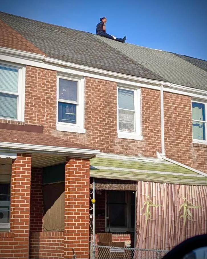 Baltimore County Police Officer Rescues Stranded Dog from Rooftop