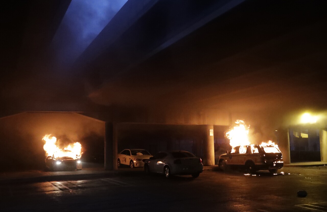 2 Miami police cars burn during protests, May 30