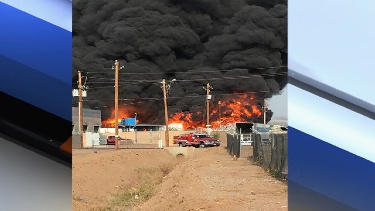PHOTOS: Fire burns at PHX recycling plant
