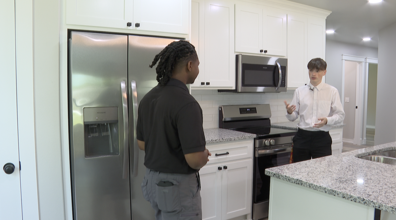 two shot WARNER HOME BUILDING PROGRAM