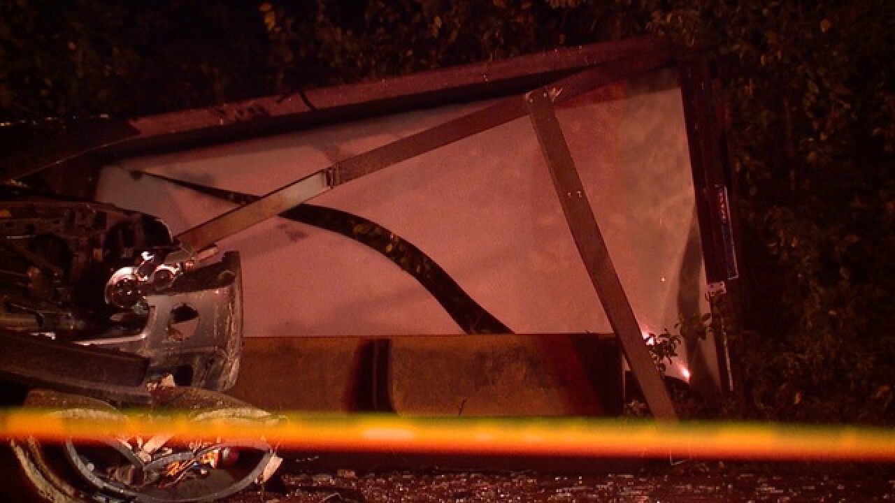 SUV crashes into a pole, trash can, bus shelter