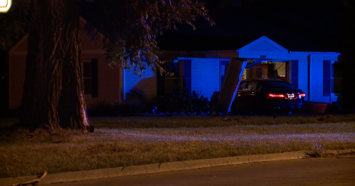 Car hits tree, crashes into home on Cleveland's West Side