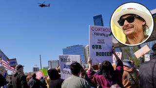 A blackhawk helicoper and Kid Rock