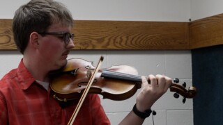 Elliot Cleary plays the violin